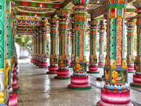 Colorful patterns and religious symbols adorn the columns at the Madduvil Panriththalaichchi Amman Kovil (Madduvil Panriththalachchi Amman H...