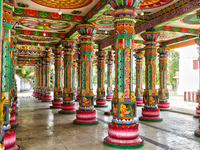 Colorful patterns and religious symbols adorn the columns at the Madduvil Panriththalaichchi Amman Kovil (Madduvil Panriththalachchi Amman H...