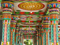 Colorful patterns and religious symbols adorn the columns at the Madduvil Panriththalaichchi Amman Kovil (Madduvil Panriththalachchi Amman H...