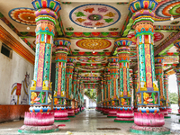 Colorful patterns and religious symbols adorn the columns at the Madduvil Panriththalaichchi Amman Kovil (Madduvil Panriththalachchi Amman H...