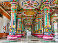 Colorful patterns and religious symbols adorn the columns at the Madduvil Panriththalaichchi Amman Kovil (Madduvil Panriththalachchi Amman H...