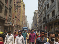 Workers coming out from different garments factories on their way home during lunch break in Narayanganj on April 24, 2019. (