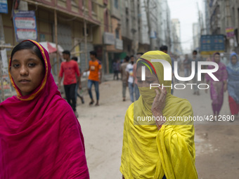 Workers coming out from different garments factories on their way home during lunch break in Narayanganj on April 24, 2019. (