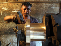  Bangladeshi worker works in a dockyard on the bank of River Buriganga, Dhaka, Bangladesh on 30 April 2019.. (