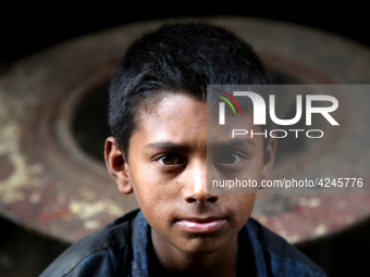 Bangladeshi worker works in a dockyard on the bank of River Buriganga, Dhaka, Bangladesh. (