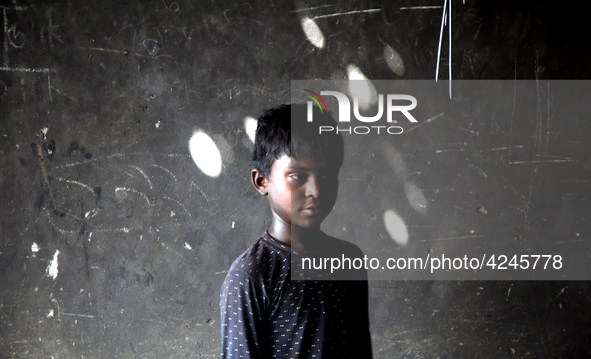 Bangladeshi worker works in a dockyard on the bank of River Buriganga, Dhaka, Bangladesh. 