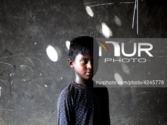 Bangladeshi worker works in a dockyard on the bank of River Buriganga, Dhaka, Bangladesh. (