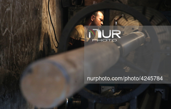 Bangladeshi worker works in a dockyard on the bank of River Buriganga, Dhaka, Bangladesh. 