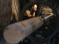 Bangladeshi worker works in a dockyard on the bank of River Buriganga, Dhaka, Bangladesh. (