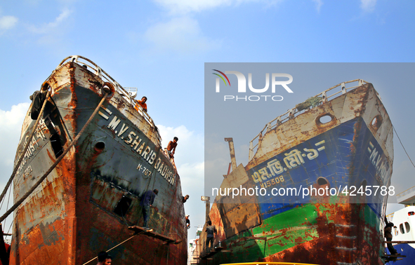 Bangladeshi worker works in a dockyard on the bank of River Buriganga, Dhaka, Bangladesh. 