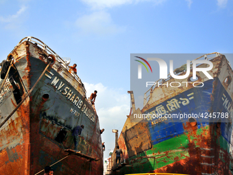 Bangladeshi worker works in a dockyard on the bank of River Buriganga, Dhaka, Bangladesh. (