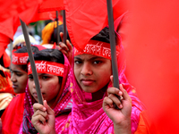 Bangladeshi garment workers and other labor organization activists take part in a rally to mark May Day or International Workers' Day in Dha...