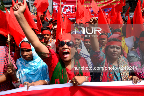 Bangladeshi garment workers and other labor organization activists take part in a rally to mark May Day or International Workers' Day in Dha...