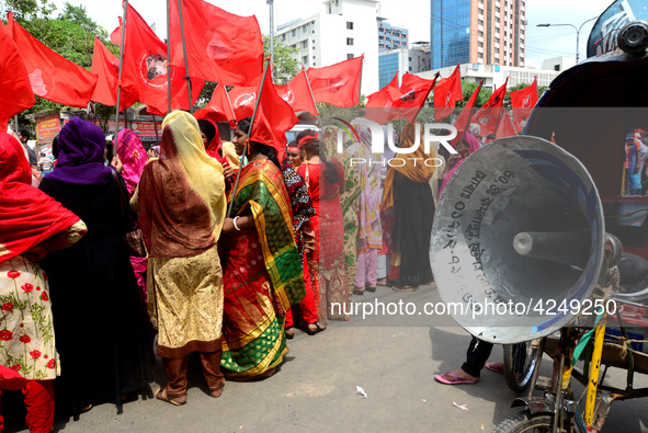 Bangladeshi garment workers and other labor organization activists take part in a rally to mark May Day or International Workers' Day in Dha...