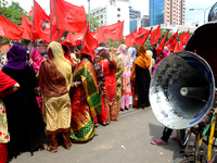 Bangladeshi garment workers and other labor organization activists take part in a rally to mark May Day or International Workers' Day in Dha...