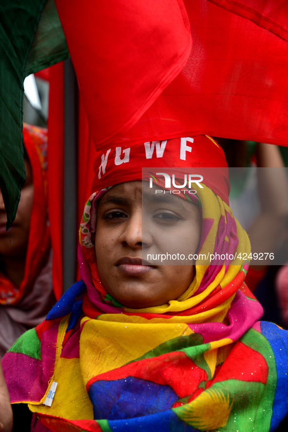 Bangladeshi garment workers and other labor organization activists take part in a rally to mark May Day or International Workers' Day in Dha...