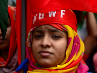 Bangladeshi garment workers and other labor organization activists take part in a rally to mark May Day or International Workers' Day in Dha...