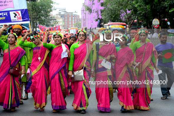 Bangladeshi garment workers and other labor organization activists take part in a rally to mark May Day or International Workers' Day in Dha...