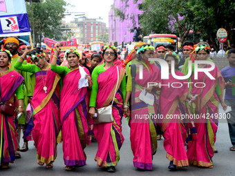 Bangladeshi garment workers and other labor organization activists take part in a rally to mark May Day or International Workers' Day in Dha...