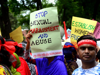 Bangladeshi garment workers and other labor organization activists take part in a rally to mark May Day or International Workers' Day in Dha...