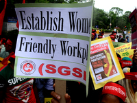 Bangladeshi garment workers and other labor organization activists take part in a rally to mark May Day or International Workers' Day in Dha...