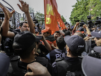 Protesters is arrested during a clash with police on a street in the Besiktas neighbourhood during a May Day demonstration on 1 May 2019 in...