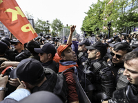 Protesters is arrested during a clash with police on a street in the Besiktas neighbourhood during a May Day demonstration on 1 May 2019 in...