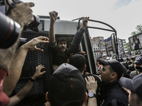 Protesters is arrested during a clash with police on a street in the Besiktas neighbourhood during a May Day demonstration on 1 May 2019 in...