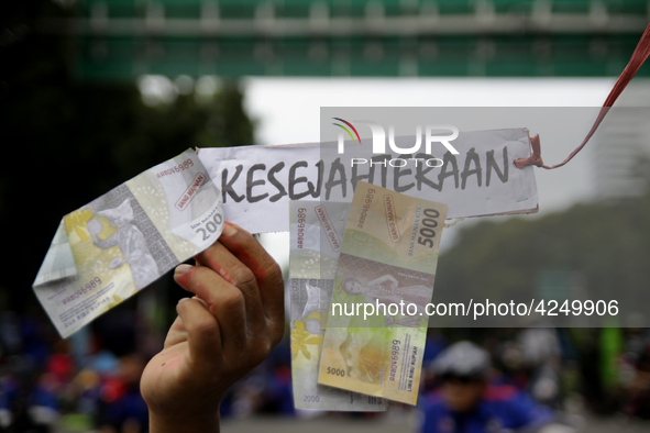 Thousand of labours from various labour organizations commemorating the International Labour Day or knows as May Day in Jakarta on May 1, 20...