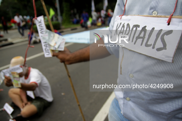 Thousand of labours from various labour organizations commemorating the International Labour Day or knows as May Day in Jakarta on May 1, 20...