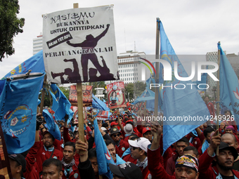 Thousand of labours from various labour organizations commemorating the International Labour Day or knows as May Day in Jakarta on May 1, 20...