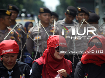 Thousand of labours from various labour organizations commemorating the International Labour Day or knows as May Day in Jakarta on May 1, 20...