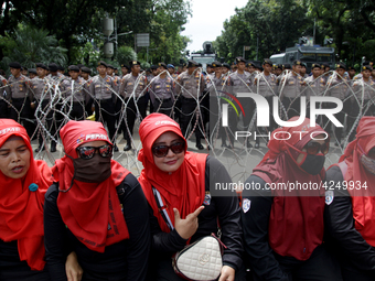 Thousand of labours from various labour organizations commemorating the International Labour Day or knows as May Day in Jakarta on May 1, 20...