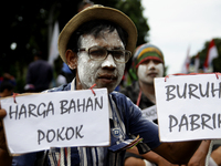 Thousand of labours from various labour organizations commemorating the International Labour Day or knows as May Day in Jakarta on May 1, 20...