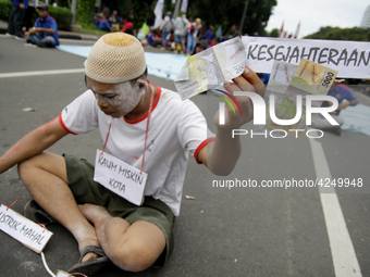 Thousand of labours from various labour organizations commemorating the International Labour Day or knows as May Day in Jakarta on May 1, 20...