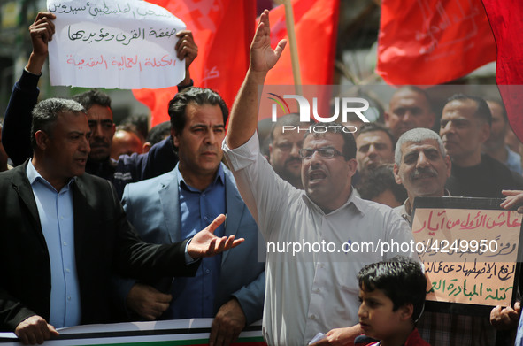 Palestinians take part in a rally marking International Workers' Day, or Labour Day, in Gaza City May 1, 2019. 