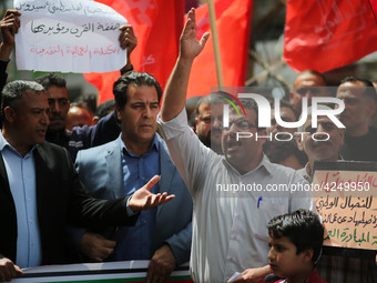 Palestinians take part in a rally marking International Workers' Day, or Labour Day, in Gaza City May 1, 2019. (