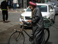 A Palestinian man walks in the street, in Gaza City  May 1, 2019.
 (