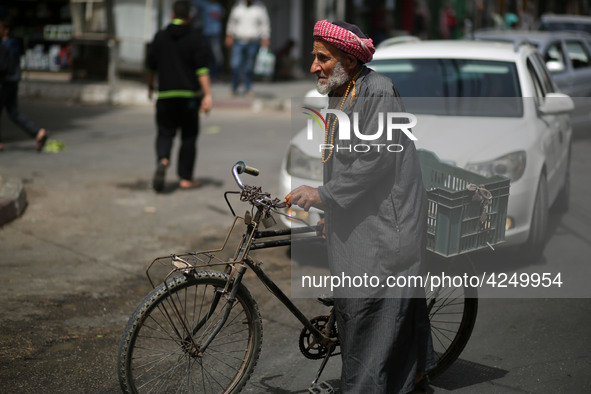 A Palestinian man walks in the street, in Gaza City  May 1, 2019.
 