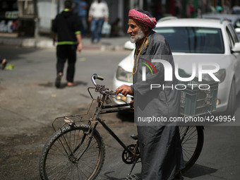 A Palestinian man walks in the street, in Gaza City  May 1, 2019.
 (