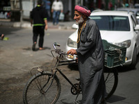 A Palestinian man walks in the street, in Gaza City  May 1, 2019.
 (