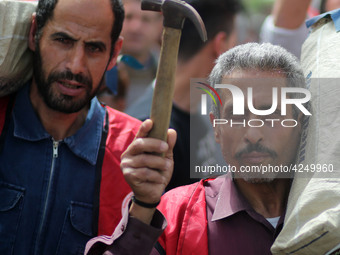 Palestinians take part in a rally marking International Workers' Day, or Labour Day, in Gaza City May 1, 2019. (