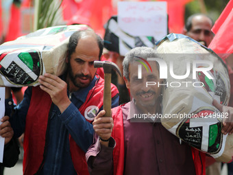 Palestinians take part in a rally marking International Workers' Day, or Labour Day, in Gaza City May 1, 2019. (