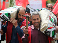 Palestinians take part in a rally marking International Workers' Day, or Labour Day, in Gaza City May 1, 2019. (