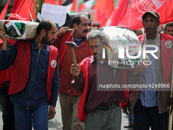 Palestinians take part in a rally marking International Workers' Day, or Labour Day, in Gaza City May 1, 2019. (