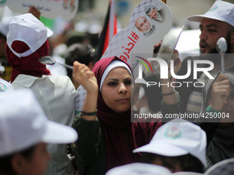 Palestinians  bang on pots during a rally marking International Workers' Day, or Labour Day, in Gaza City May 1, 2019. 
 (