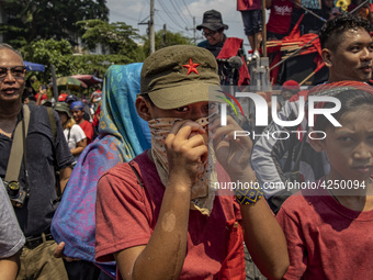 A protester takes part in Labor Day demonstrations outside the presidential palace on May 1, 2019 in Manila, Philippines. Thousands of Filip...