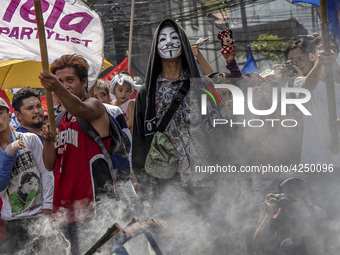 Protesters take part in Labor Day demonstrations outside the presidential palace on May 1, 2019 in Manila, Philippines. Thousands of Filipin...