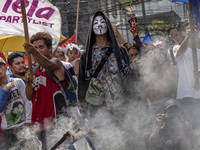 Protesters take part in Labor Day demonstrations outside the presidential palace on May 1, 2019 in Manila, Philippines. Thousands of Filipin...