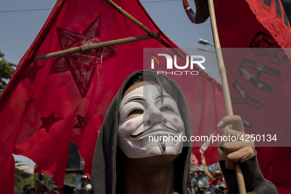 A protester takes part in Labor Day demonstrations outside the presidential palace on May 1, 2019 in Manila, Philippines. Thousands of Filip...